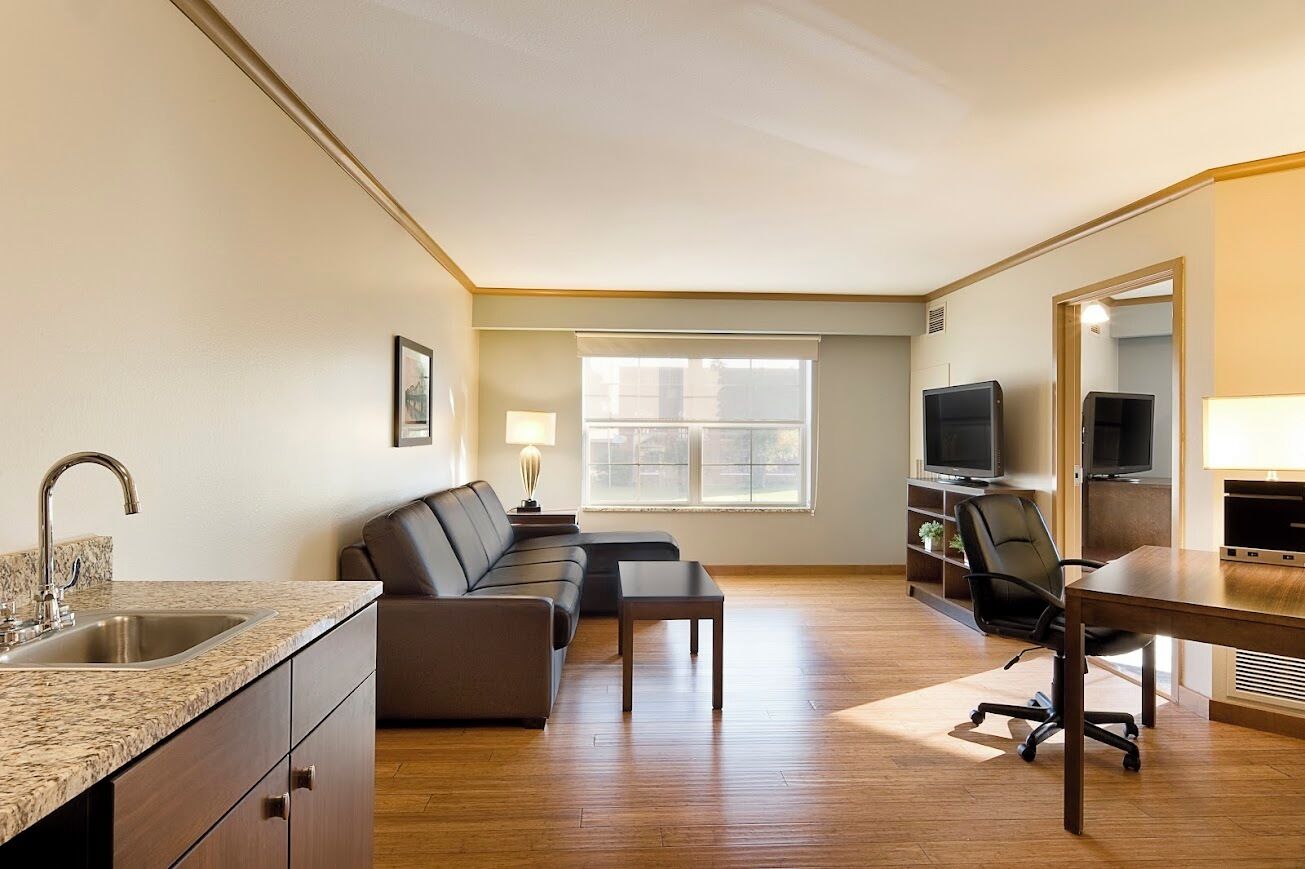 luxury suite, 1 king bed | pillow-top beds, in-room safe, desk, iron/ironing board