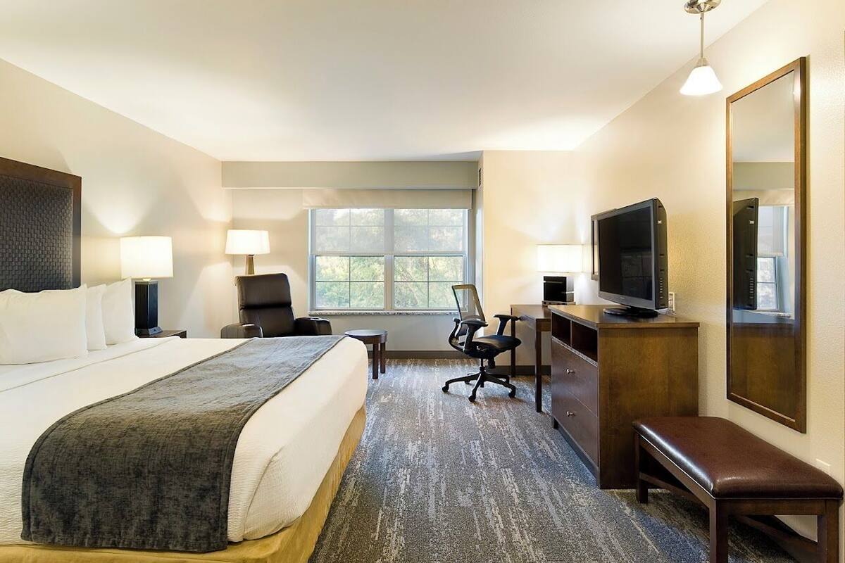 classic room, 1 king bed | pillow-top beds, in-room safe, desk, iron/ironing board