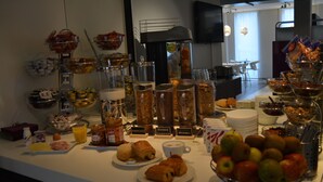 A breakfast buffet with various food items and beverages. - Best Western Hotel Brussels South (Sint-Pieters-Leeuw)