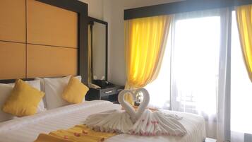 Premium Room | 1 bedroom, minibar, in-room safe, individually decorated