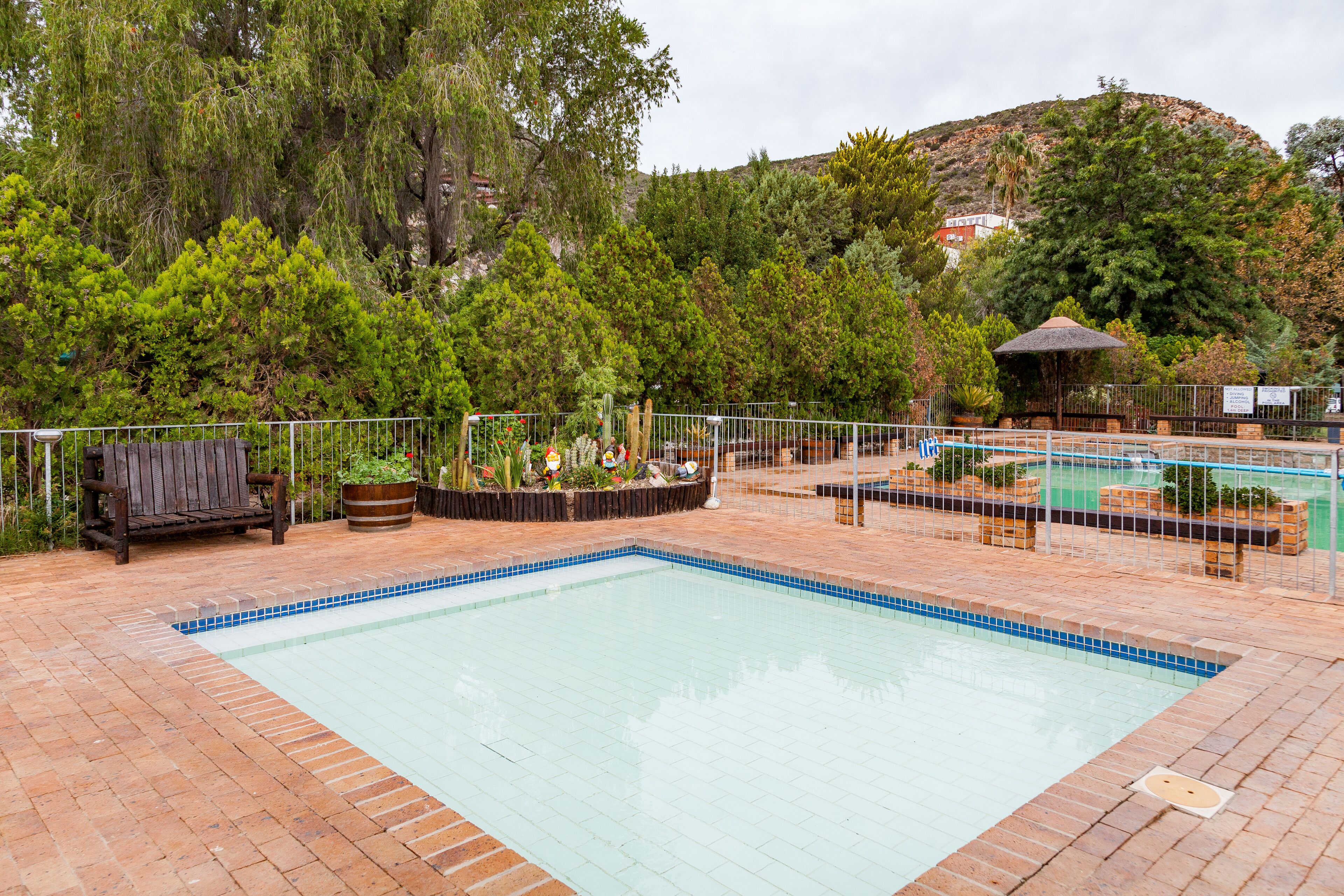 4 outdoor pools, open 8:00 AM to 10:00 PM, pool umbrellas, sun loungers