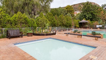 4 outdoor pools, open 8:00 AM to 10:00 PM, pool umbrellas, sun loungers