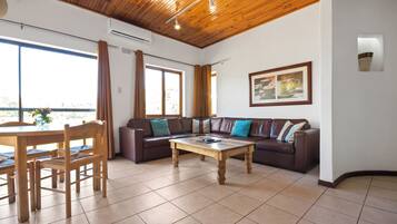 Villa | Living room | Flat-screen TV, fireplace