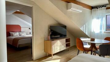 Suite Junior, non fumatori | Con stile personalizzato, con arredamento individuale, tende oscuranti