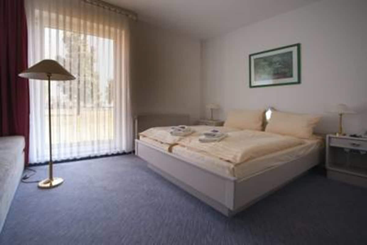 Desk, free WiFi, bed sheets