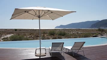 Outdoor pool, pool umbrellas, pool loungers