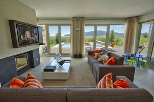 Apartment, 2 Bedrooms, Private Pool | Living room | 42-cm LCD TV with digital channels, TV, fireplace