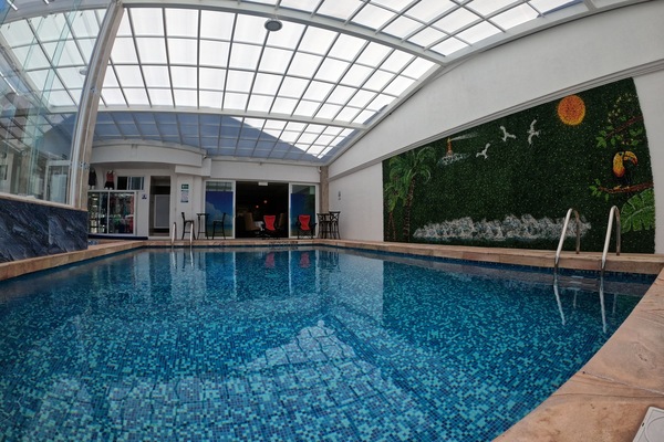 Indoor pool, open 7:00 AM to 9:00 PM, sun loungers