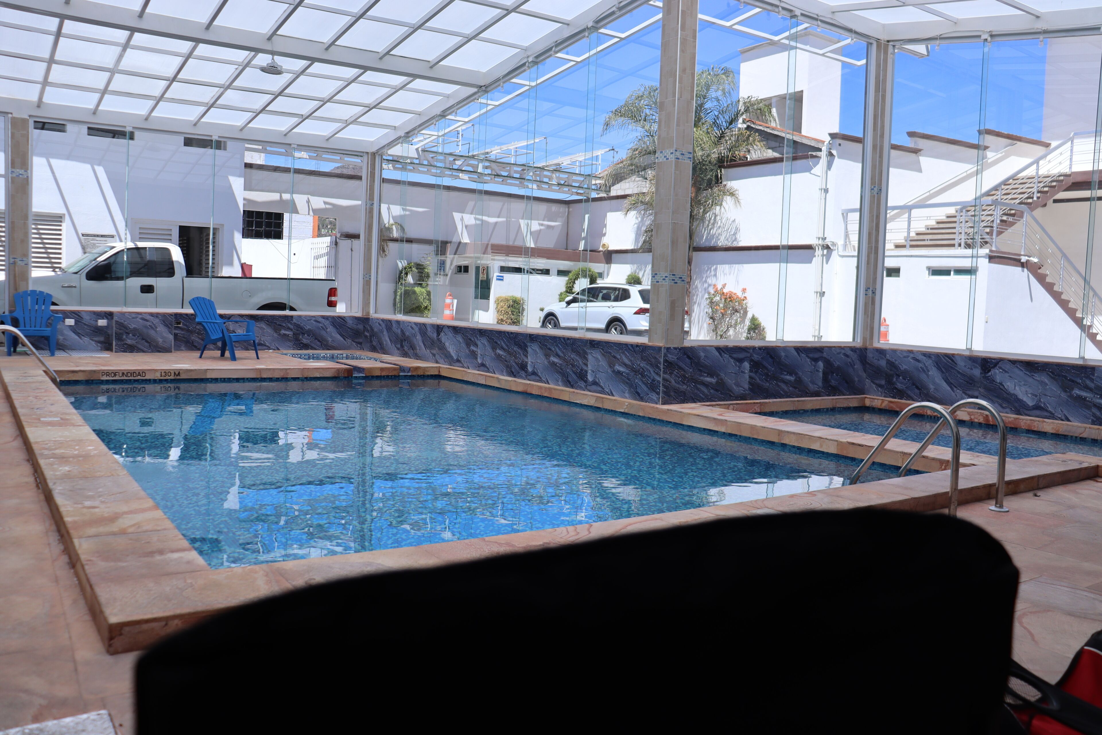 indoor pool, open 7:00 am to 10:00 pm, pool loungers