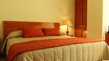 Habitacion Estandar Sencilla | Ropa de cama de alta calidad y caja de seguridad en la habitación