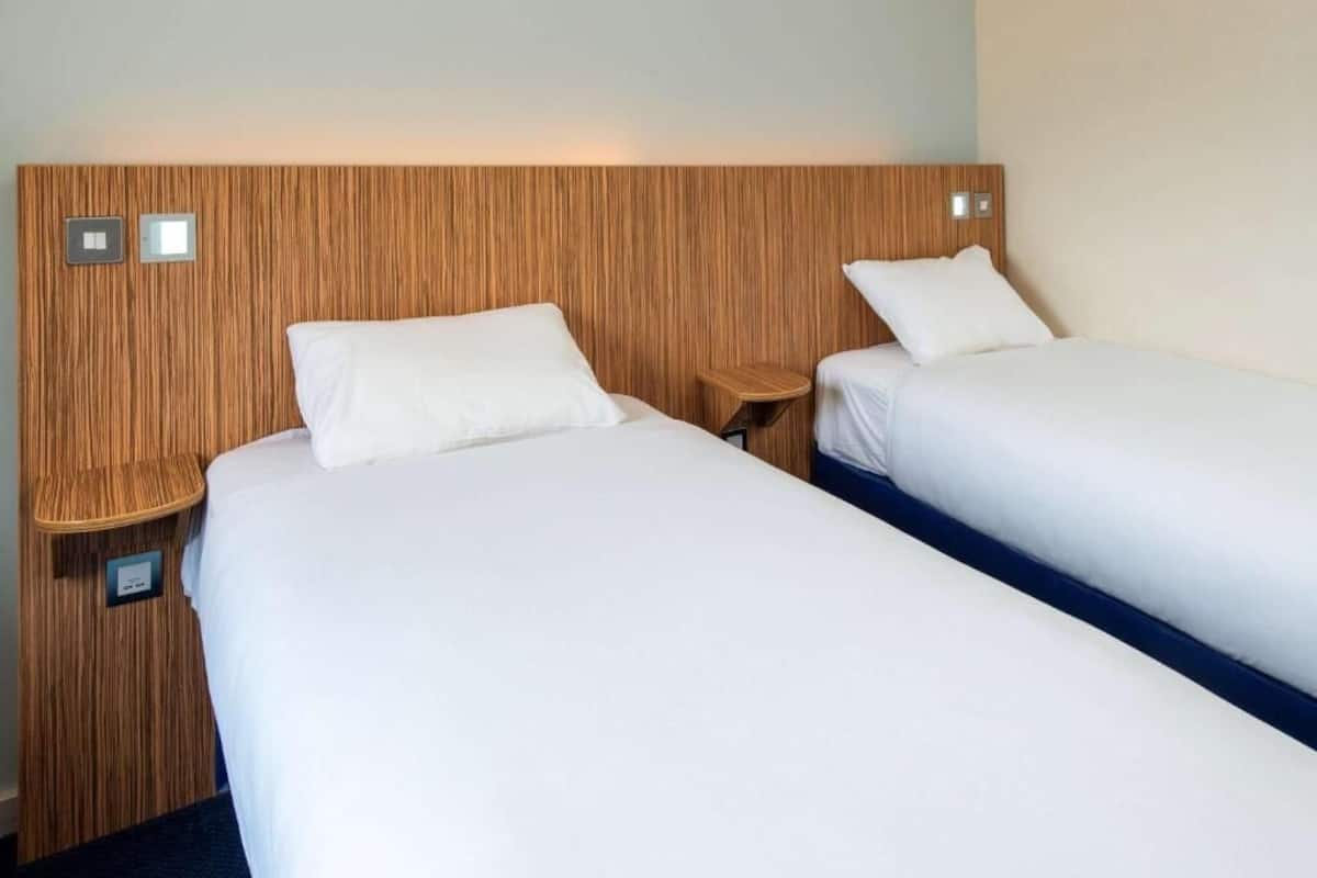 economy twin room | 1 bedroom, desk, laptop workspace, blackout curtains