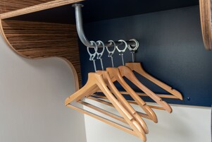 Desk, laptop workspace, blackout drapes, iron/ironing board