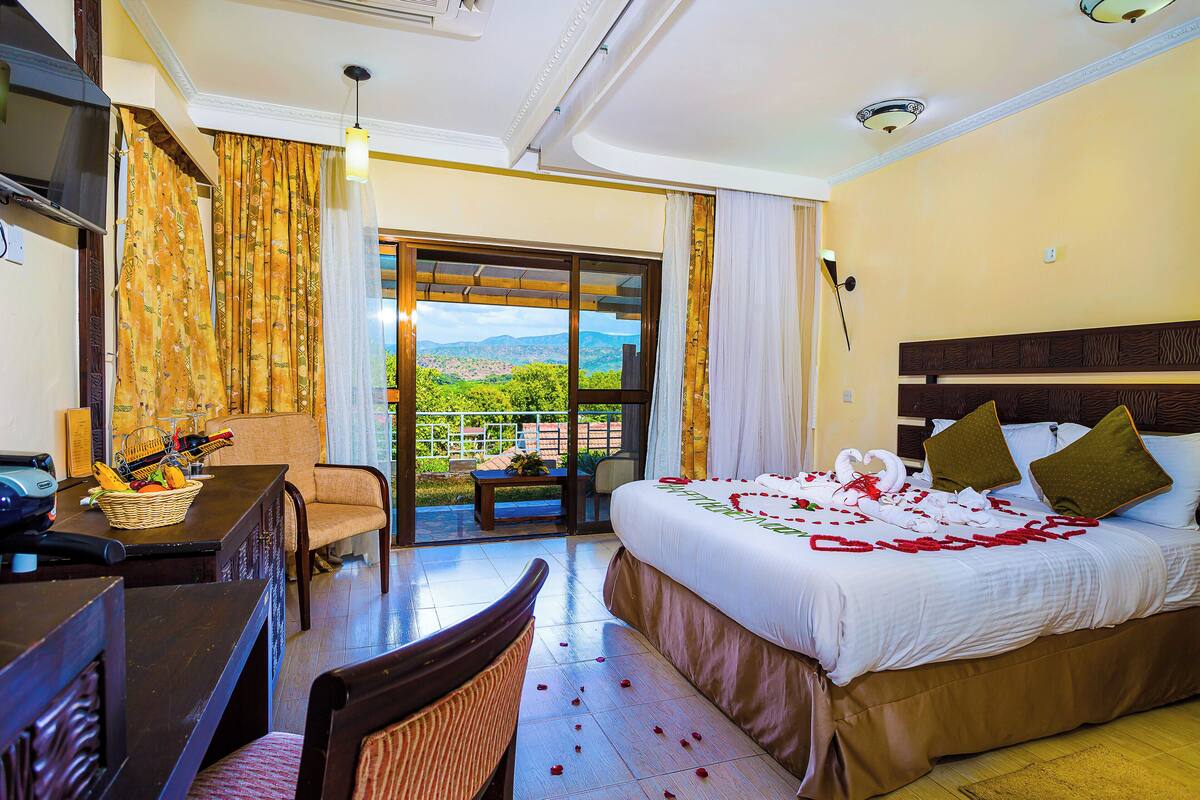 Casa de campo standard, 1 cama de casal, vista para o jardim | Escrivaninha, cortinas blackout, Wi-Fi de cortesia, roupa de cama