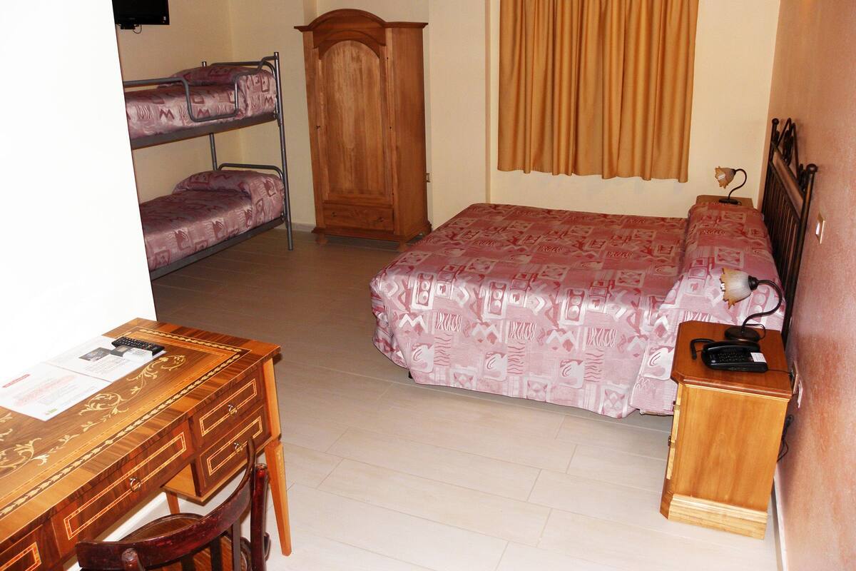 Superior Quadruple Room, Pool Access | Desk, blackout drapes, iron/ironing board (on request), WiFi (free)