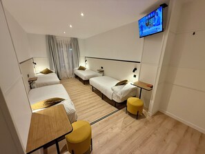 Family Quadruple Room, Multiple Beds, Balcony, City View | Desk, soundproofing, free WiFi, bed sheets - MuchoMadrid (Madrid)