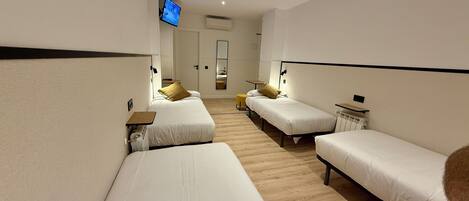 Family Quadruple Room, Multiple Beds, Balcony, City View