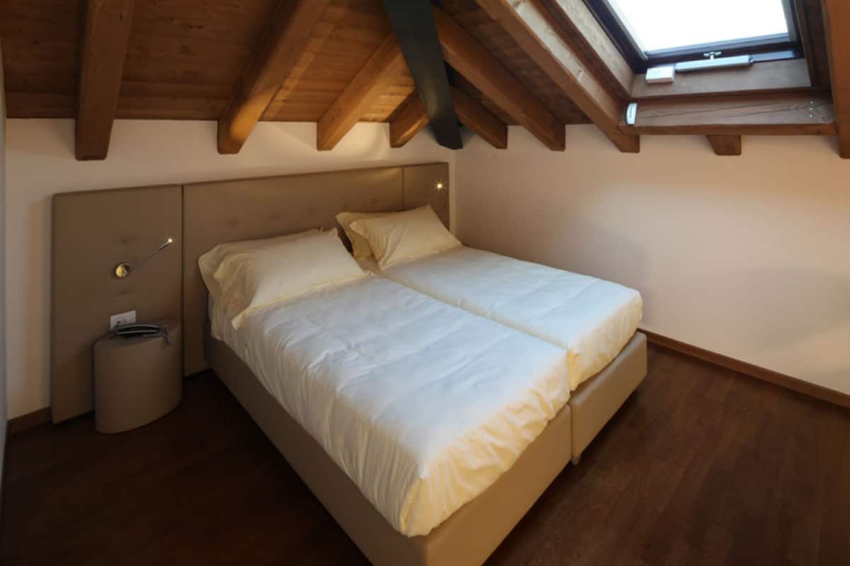 Premium bedding, down comforters, memory foam beds, minibar