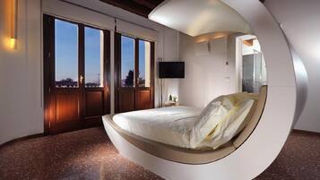 Premium bedding, down comforters, memory foam beds, minibar