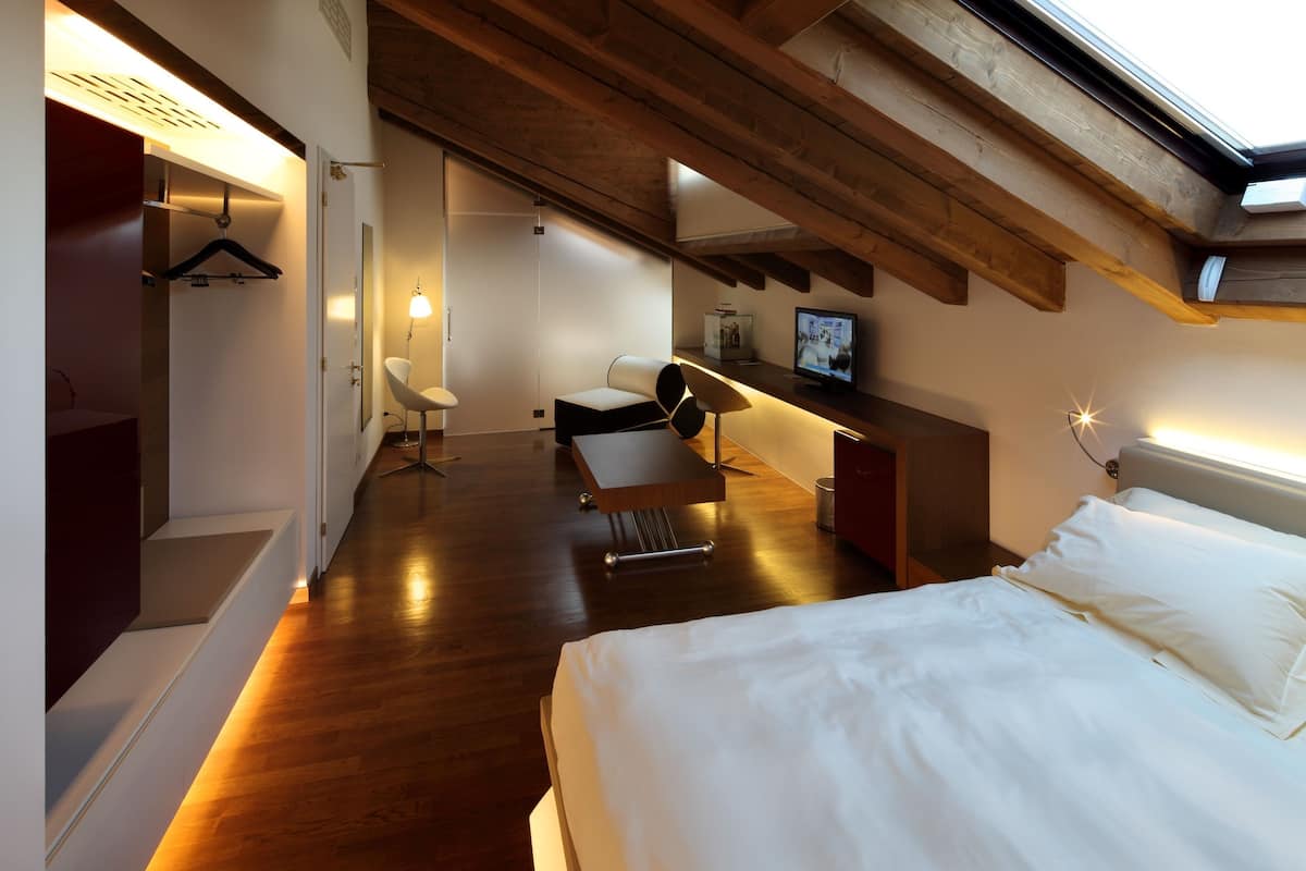 Premium bedding, down comforters, memory foam beds, minibar