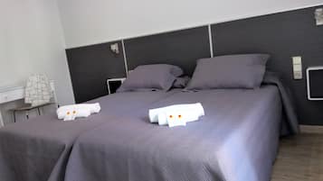 Twin Room | Premium bedding, desk, blackout drapes, iron/ironing board