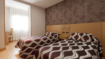 Premium bedding, desk, blackout drapes, iron/ironing board