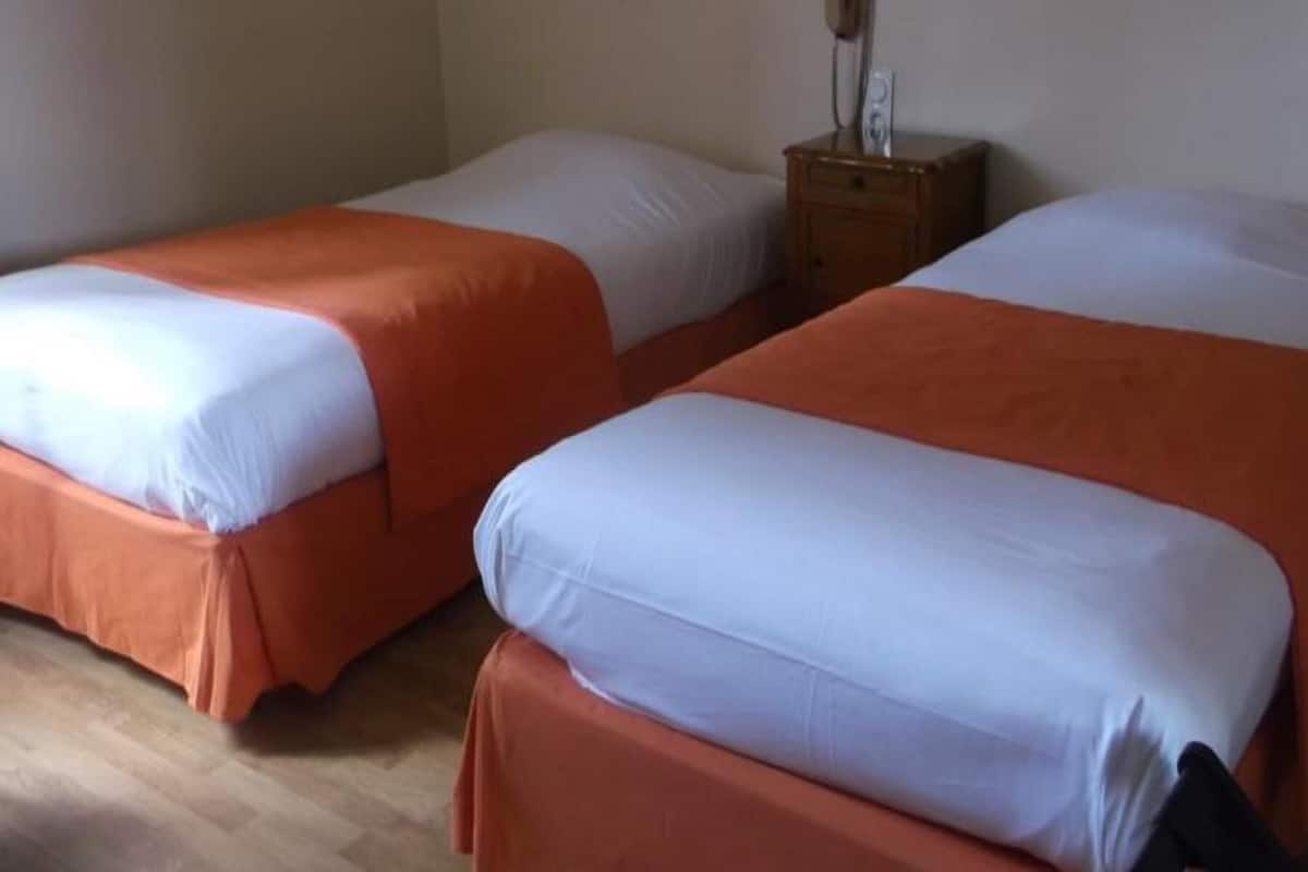 Twin Room | Blackout drapes, soundproofing, iron/ironing board (on request)