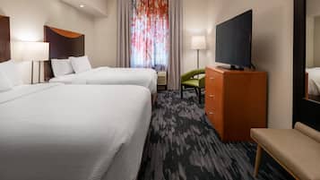 Pillow-top beds, desk, blackout curtains, iron/ironing board