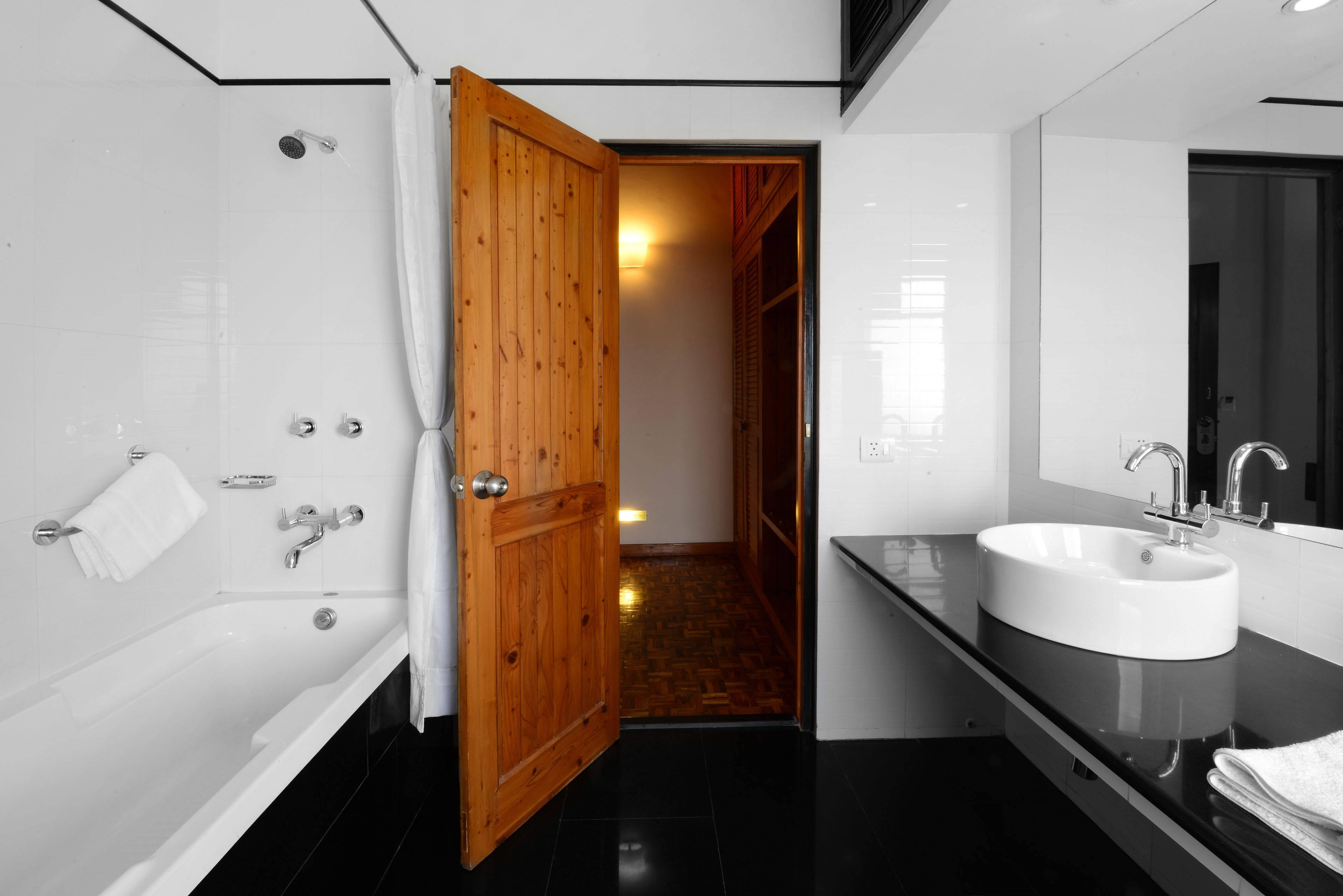 honeymoon room | bathroom | rainfall showerhead, free toiletries, hair dryer, slippers