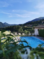 Outdoor pool, open 9:00 AM to 8:30 PM, sun loungers