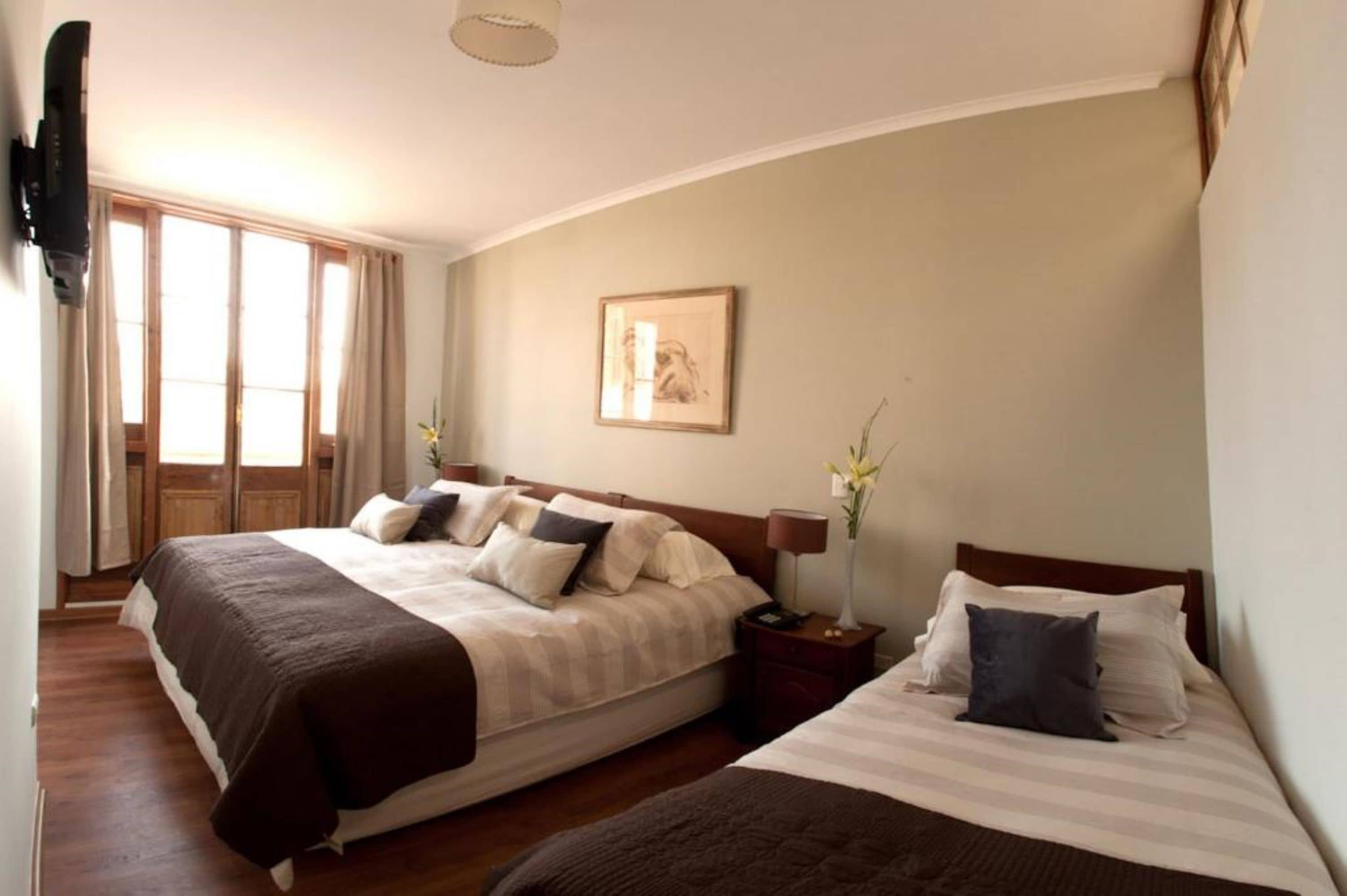 triple room | minibar, in-room safe, desk, blackout curtains