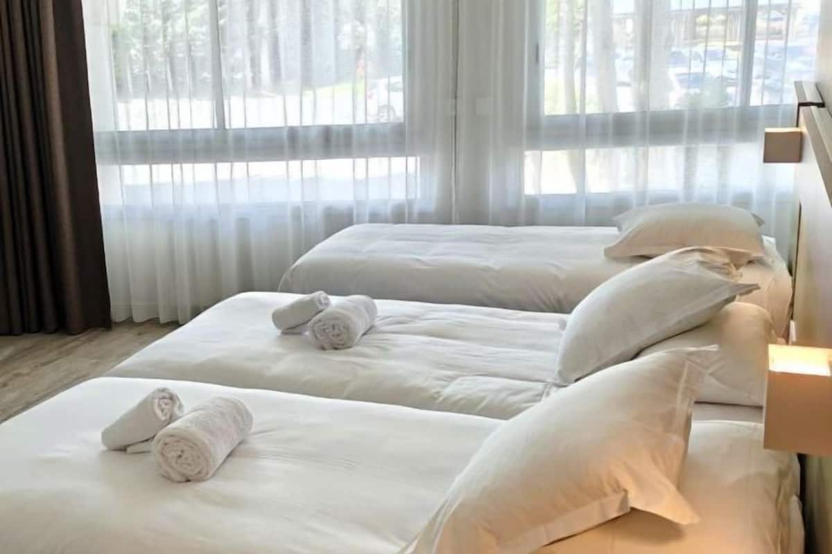 Premium bedding, individually decorated, desk, laptop workspace