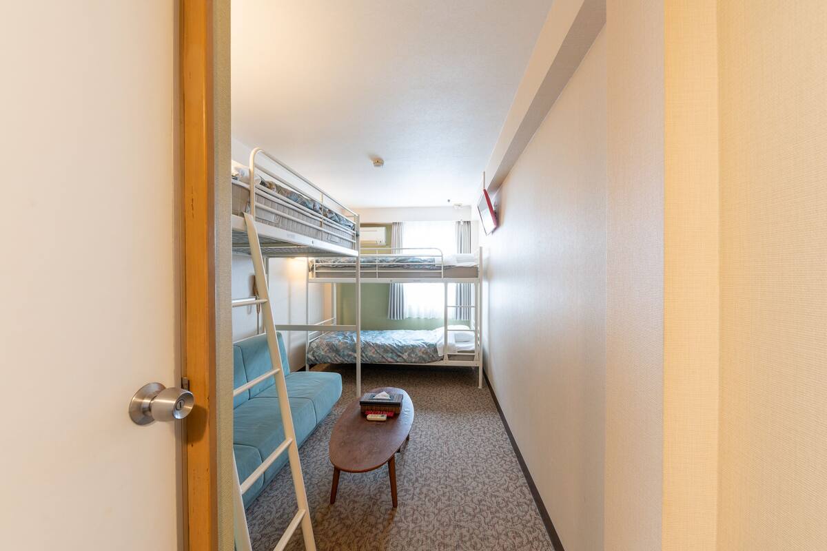 Quadruple Room | Down comforters, blackout drapes, WiFi (free)