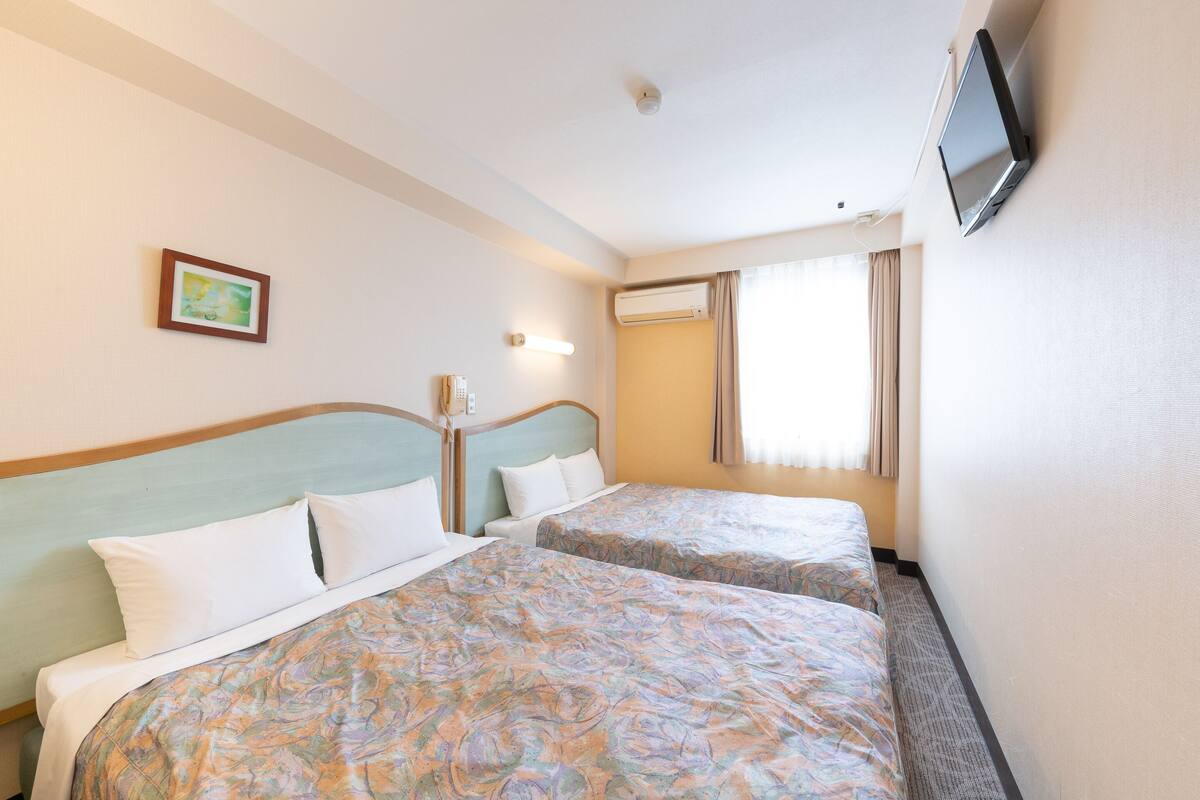 Quadruple Room | Down comforters, blackout drapes, WiFi (free)