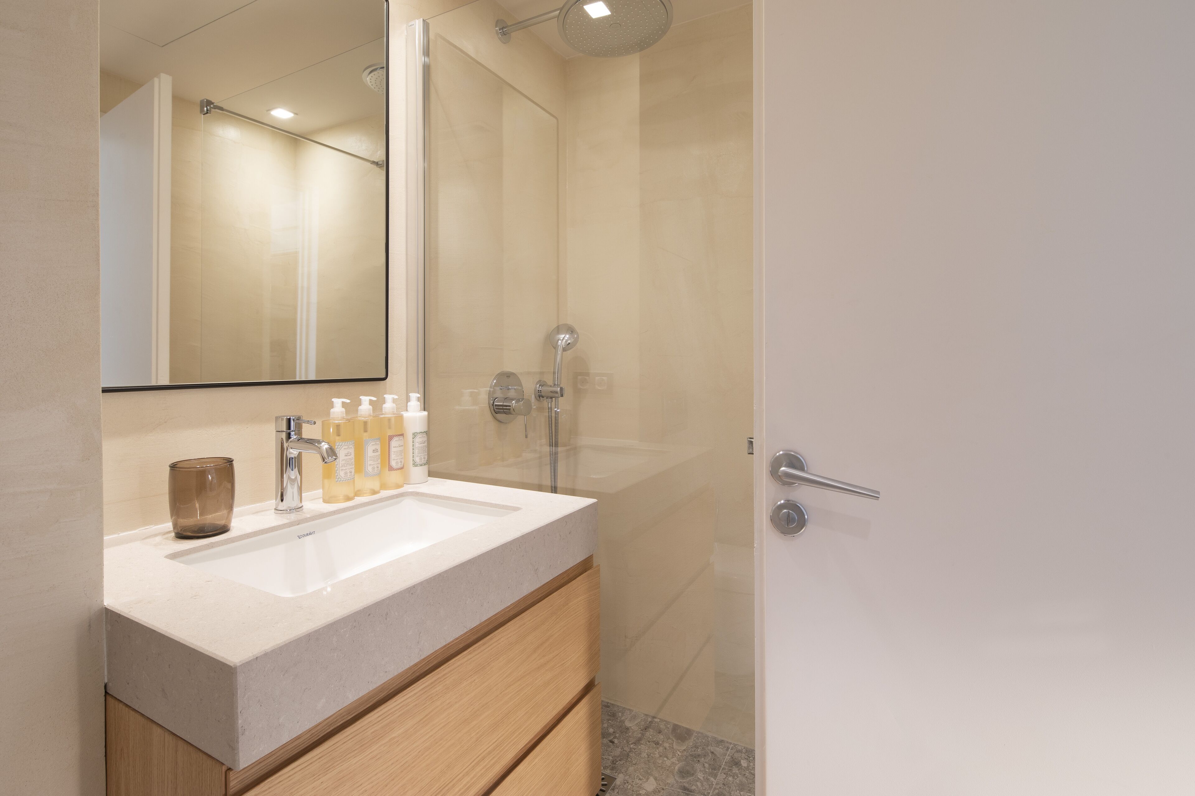 shower, rainfall showerhead, designer toiletries, hair dryer