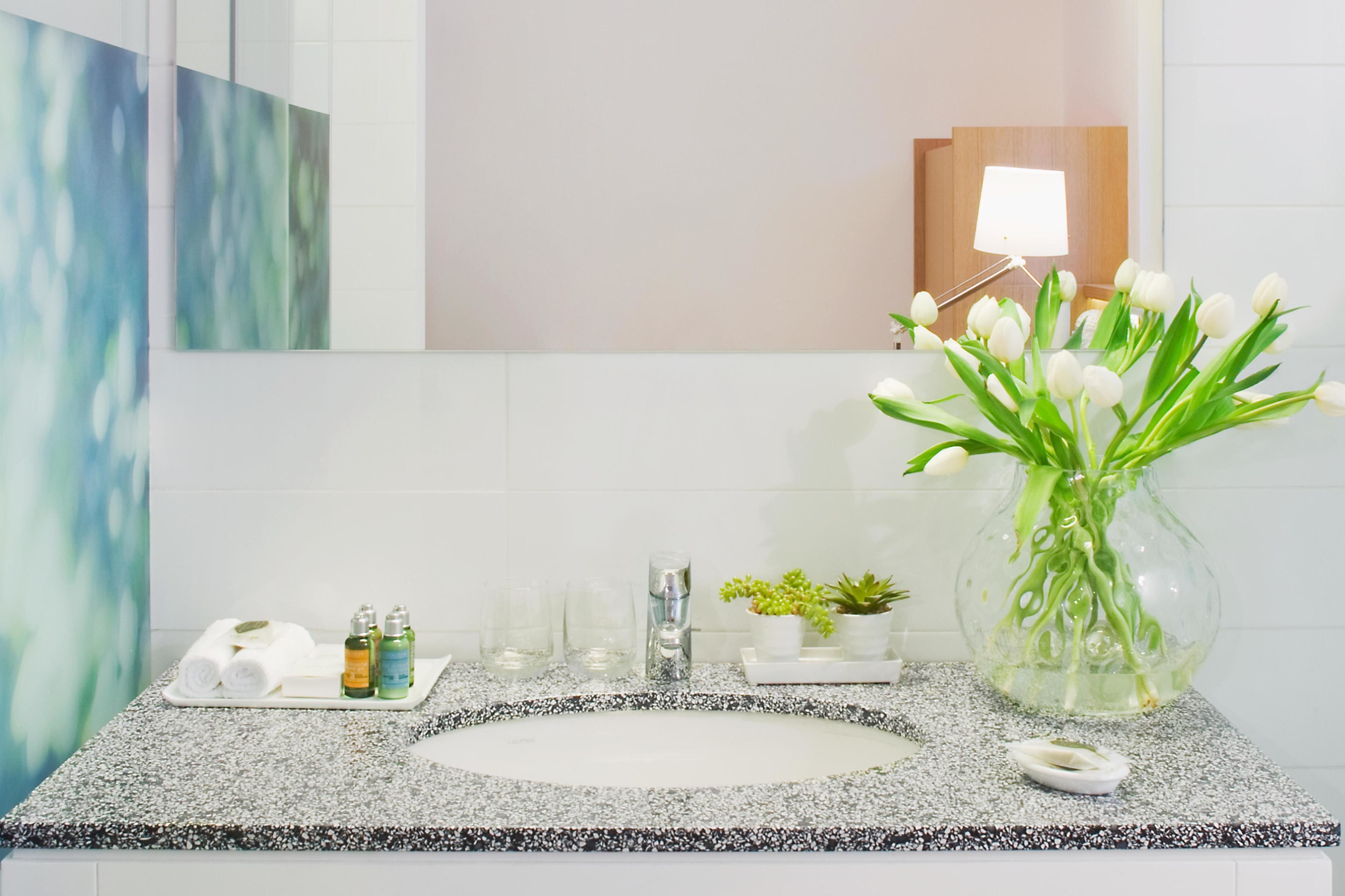 rainfall showerhead, designer toiletries, hair dryer, bathrobes