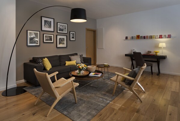 Flat-screen TV, DVD player, iPod dock, pay films