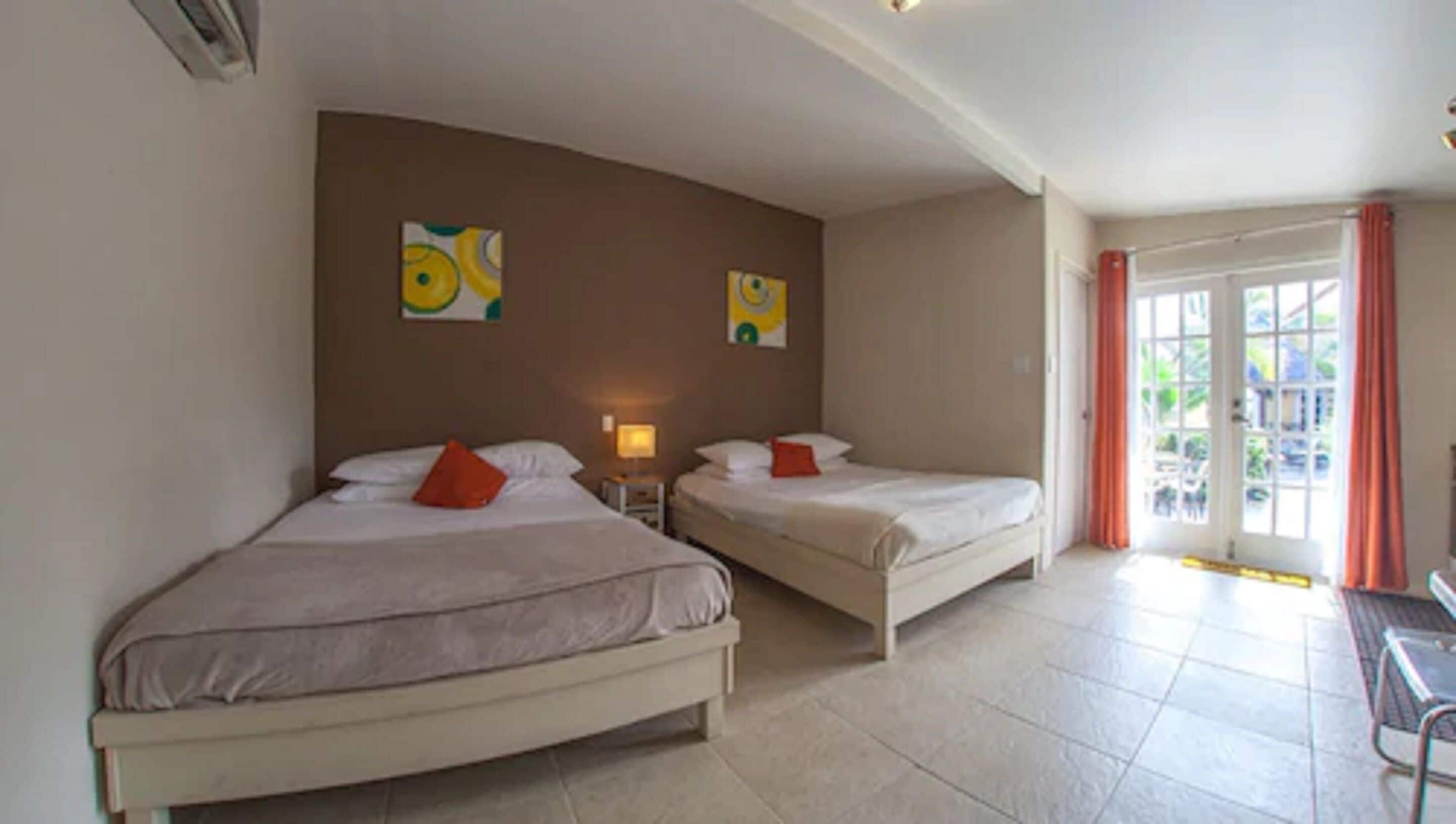 Deluxe Studio, 2 Queen Beds, Kitchen | Hypo-allergenic bedding, in-room safe, iron/ironing board