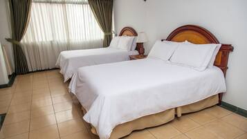 Habitación con 2 camas individuales | Ropa de cama de alta calidad y minibar
