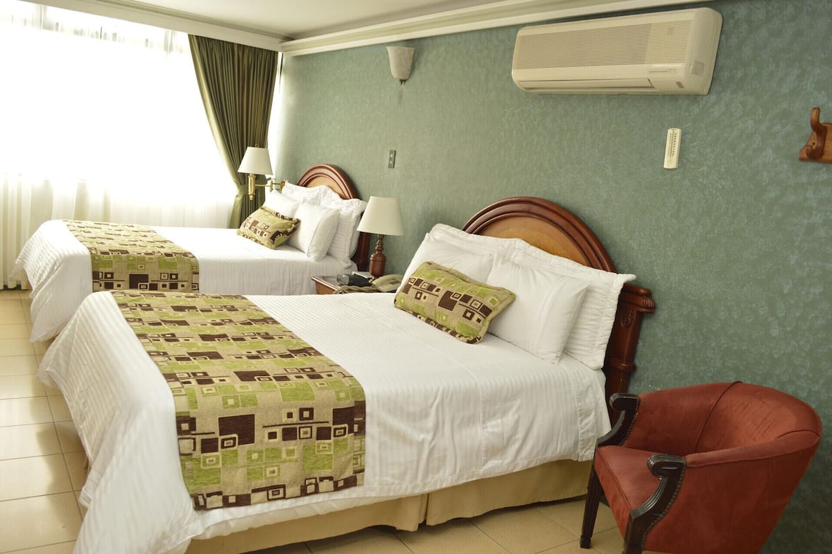 Seprai premium, minibar, brankas, dan Wi-Fi gratis