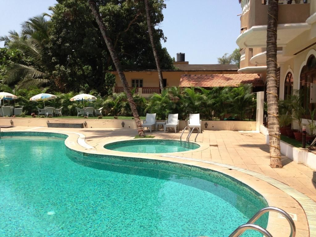 Outdoor pool, pool umbrellas, pool loungers