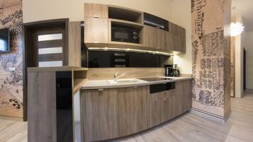 Apartment, 3 Bedrooms (Mickiewicza Street) | Private kitchenette | Full-sized fridge, microwave, stovetop, coffee/tea maker