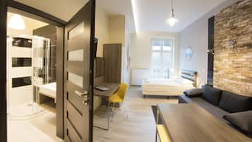 Deluxe Studio (Mickiewicza Street) | Living area | Flat-screen TV