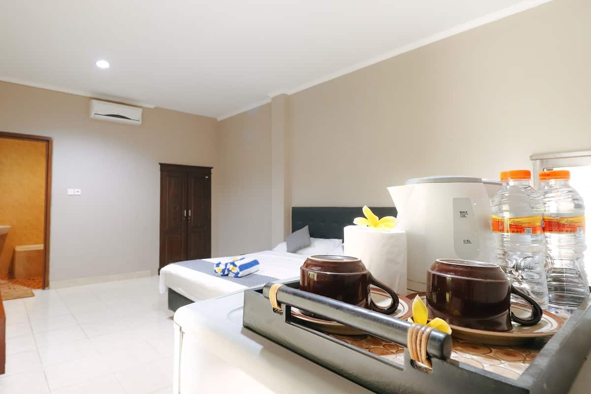 Deluxe kamer | 1 slaapkamer, een minibar, een kluis op de kamer, een bureau