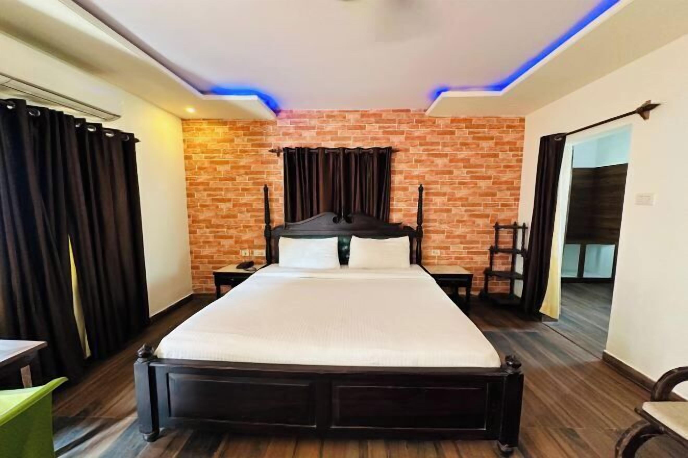 Minibar, desk, blackout curtains, iron/ironing board