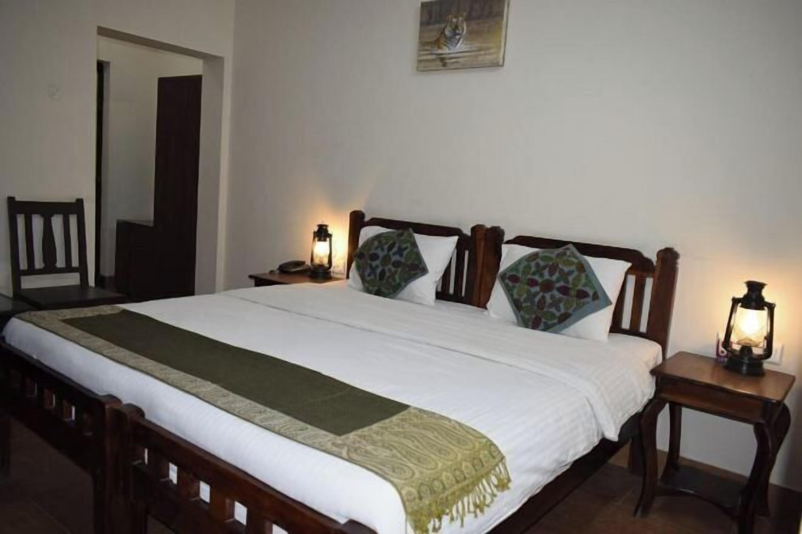 Minibar, desk, blackout curtains, iron/ironing board