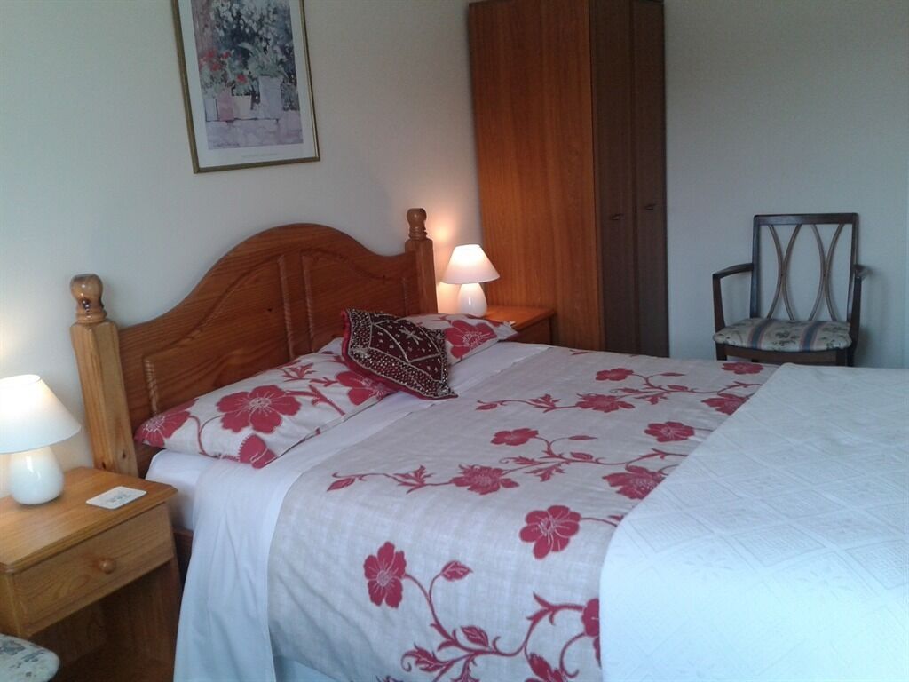 Quarto casal, banheiro compartilhado