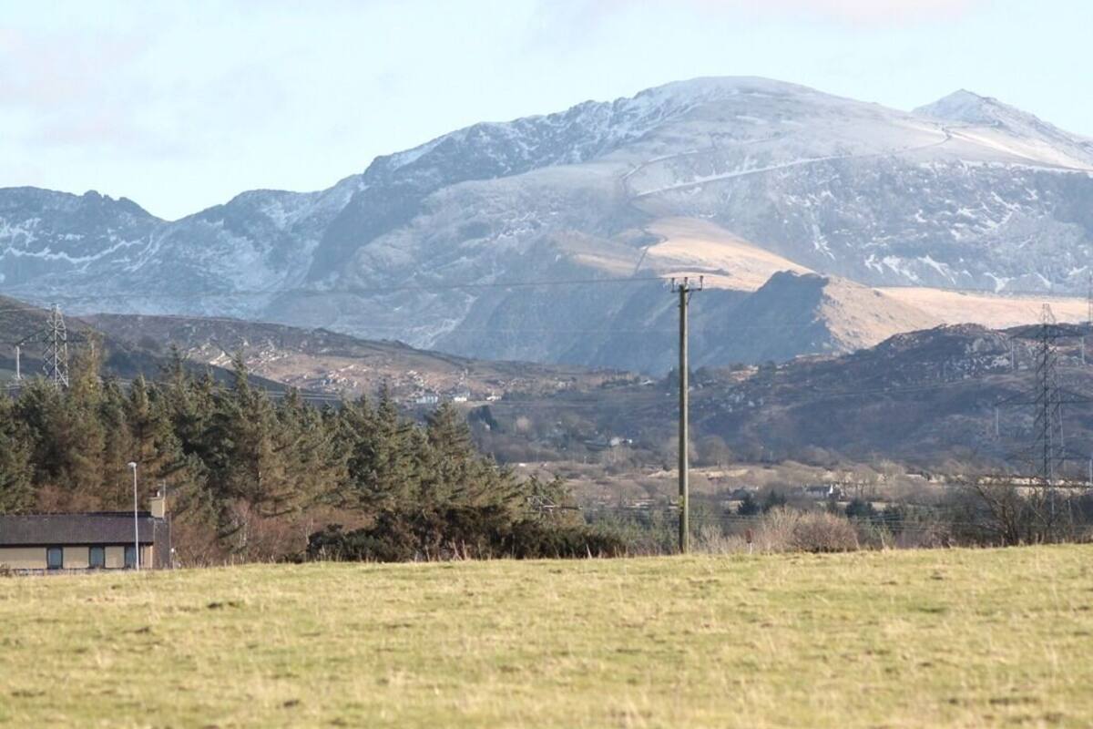 A mountainous landscape with a clear sky.
