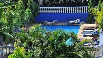 Outdoor pool, pool umbrellas, pool loungers