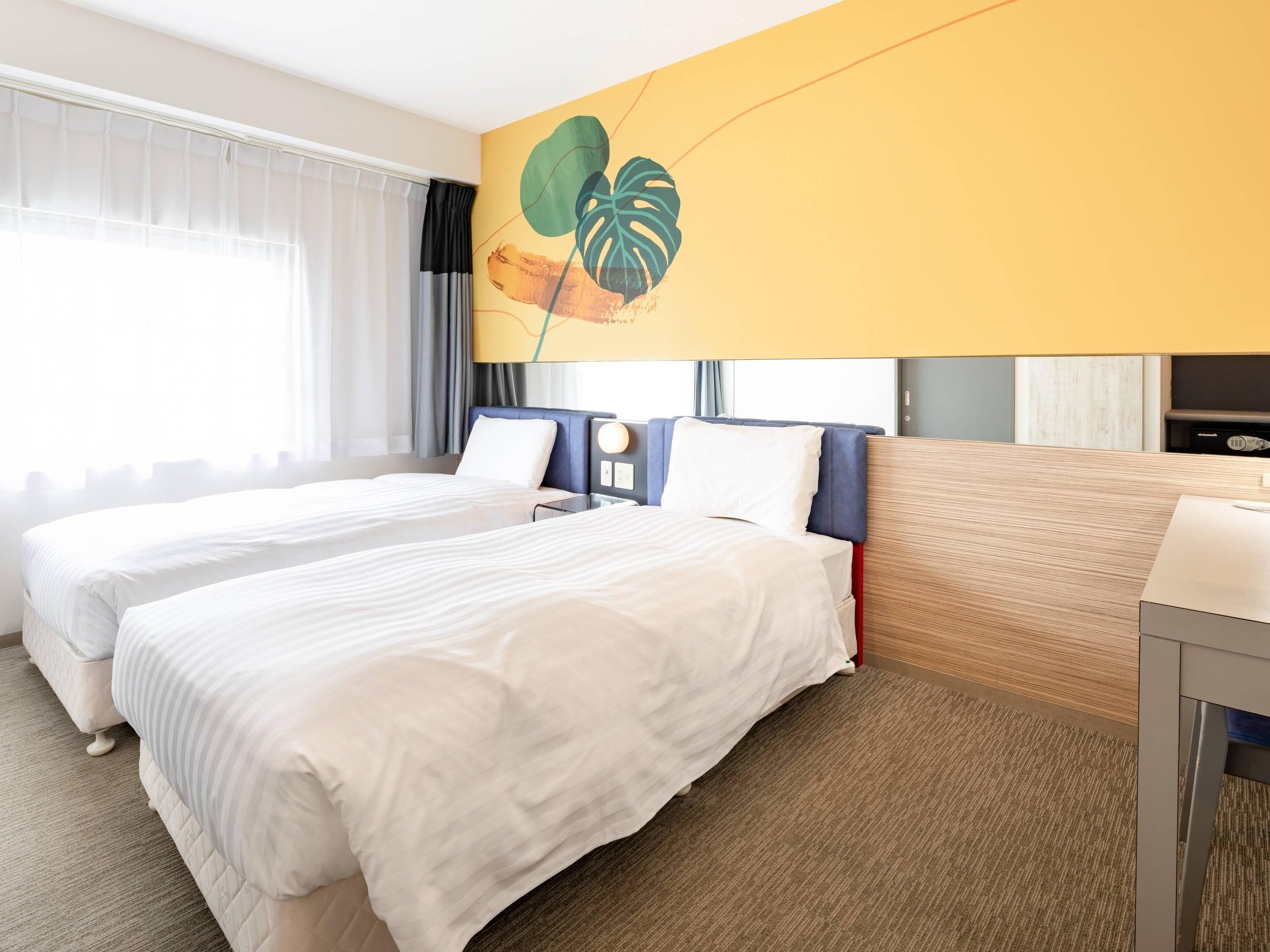 标准房, 2 张单人床, 无烟房 | 羽绒被、客房内保险箱、办公桌、隔音