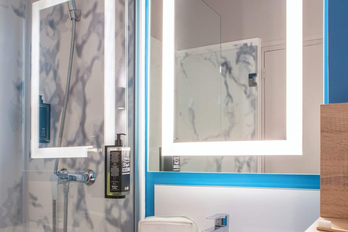 Shower, eco-friendly toiletries, hair dryer, towels